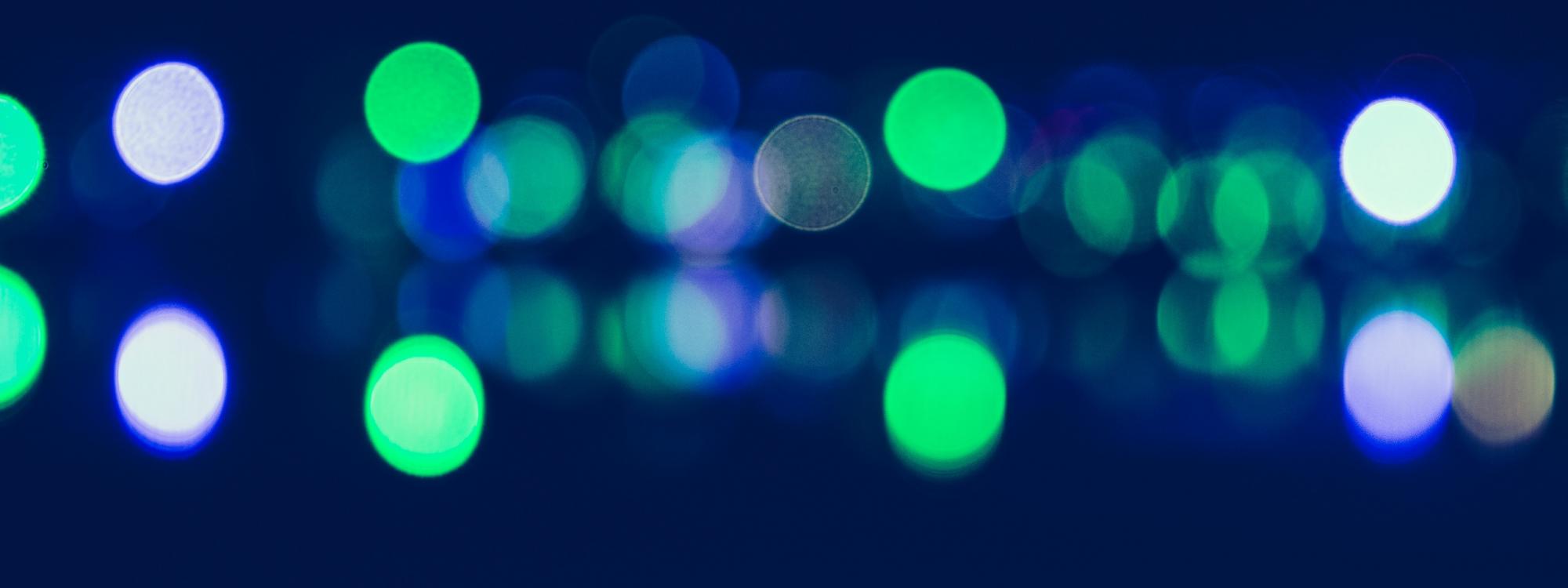 Bright dots on blue background
